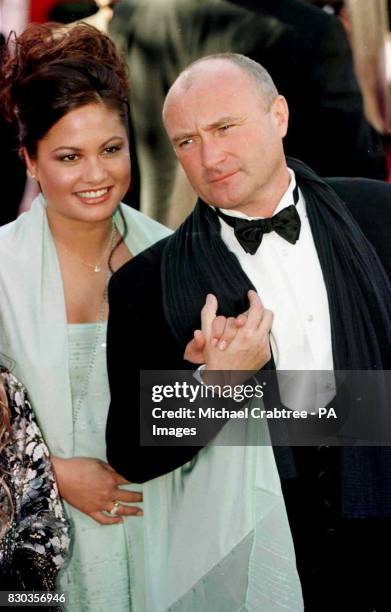 Singer Songwriter Phil Collins and his wife, Orianne, arrive for the 72nd Annual Academy Awards at the Shrine Auditorium in Los Angeles, USA. Collins...