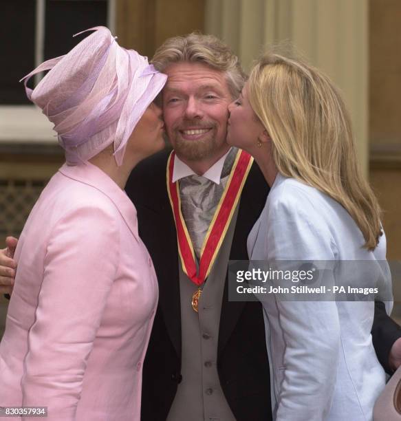 Sir Richard Branson with his wife Joan and daughter Holly after he was knighted by the Prince of Wales at Buckingham Palace in London. The...