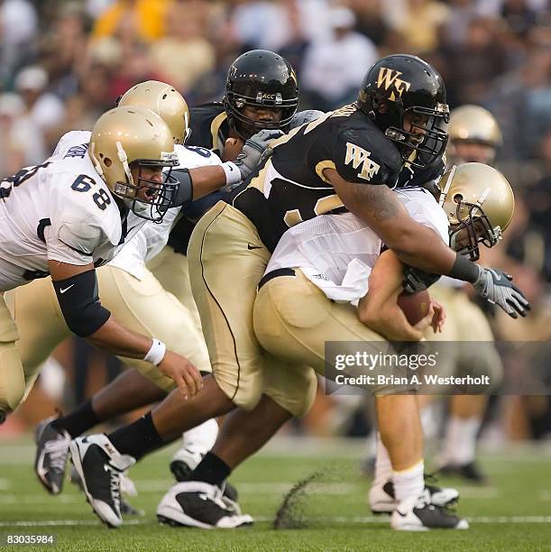 Boo Robinson of the Wake Forest Demon Deacons sacks quarterback Jarod Bryant of the Navy Midshipmen during second half action on September 27, 2008...