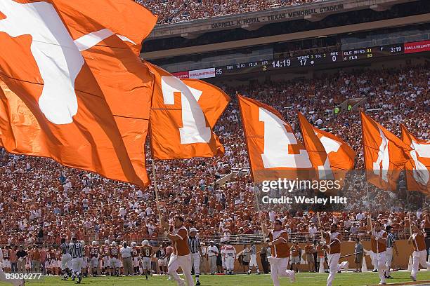 The Texas Longhorns celebrate a victory against the Arkansas Razorbacks at Darrell K. Royal-Texas Memorial Stadium on September 27, 2008 in Austin,...