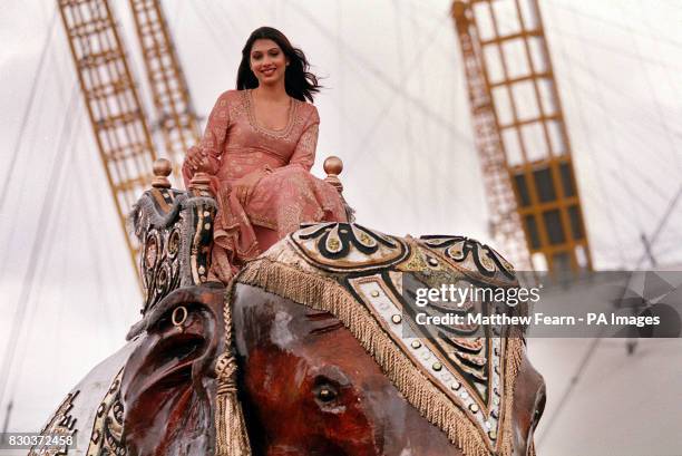 Yukta Mookhey, the current Miss World from India, astride a wooden elephant at the launch of the International Indian Film Awards, at the Millenniium...