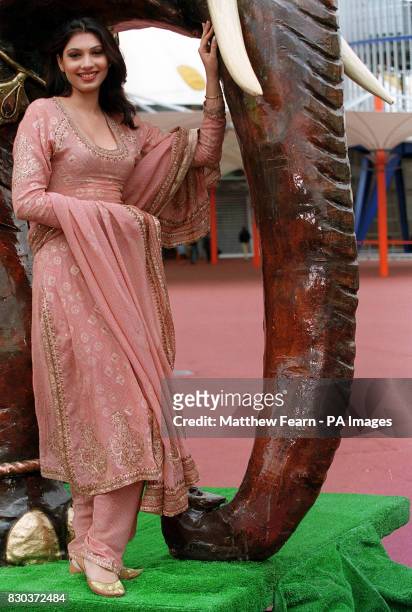 Yukta Mookhey, the current Miss World from India, next to a wooden elephant at the launch of the International Indian Film Awards, at the Millenniium...