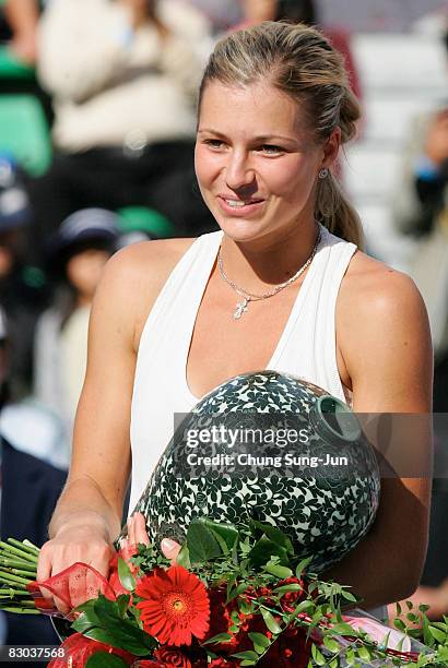 Maria Kirilenko of Russia celebrates after defeating Samantha Stosur of Australia by a score of 2-6, 6-1, 6-4 to win the Women's Singles Final on day...