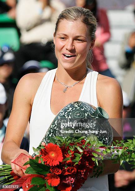 Maria Kirilenko of Russia celebrates after defeating Samantha Stosur of Australia by a score of 2-6, 6-1, 6-4 to win the Women's Singles Final on day...