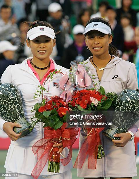 Su-Wei Hsieh and Chia-Jung Chuang of Chinese Taipei celebrates with the trophy after defeating Maria Kirilenko and Vera Dushevina of Russia by a...