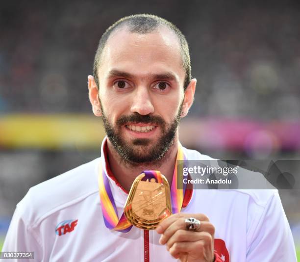 Gold medalist Ramil Guliyev of Turkey poses with his medal for the Men's 200 metres during the "IAAF Athletics World Championships London 2017" at...