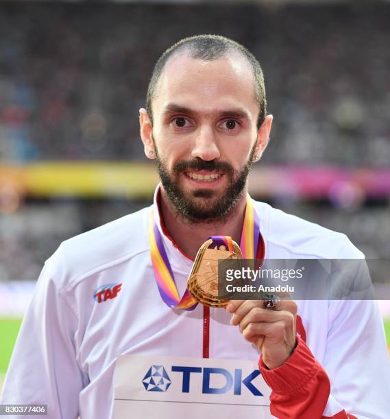 Gold medalist Ramil Guliyev of Turkey poses with his medal for the Men's 200 metres during the "IAAF Athletics World Championships London 2017" at...