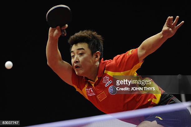 Chinese Hao Wang hits the ball to Greek Kali Kreanga during the semi final match of the World Cup Table Tennis, on September 28, 2008 in Liege. AFP...