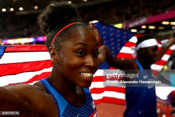 Tianna Bartoletta of the United States, bronze, and Brittney Reese of the United States, gold, celebrate after the women's long jump during day eight...