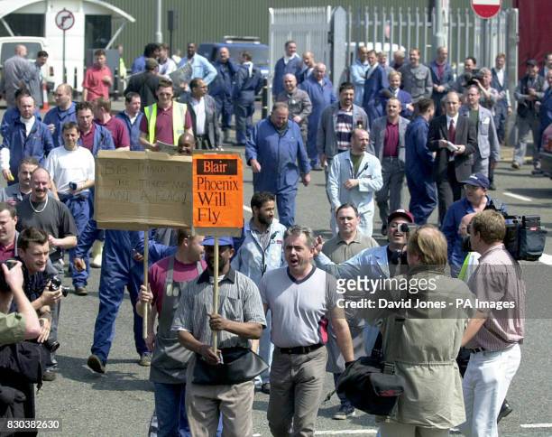Workers leave the Rover plant at lunchtime with a sense of celebration after a dramatic rescue deal which has saved the firm from closure. At least...