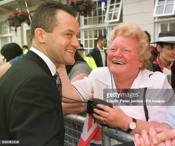Princess Diana's former butler Paul Burrell meets 60 year-old Margaret Morrison from Glenrothes, Scotland, before the wedding of HRH Prince Edward,...
