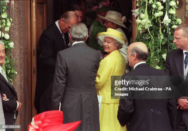 Britain's Queen Elizabeth II and the Duke of Edinburgh arrive at the Greek Orthodox Cathedral of St. Sophia in Bayswater, west London, for the...