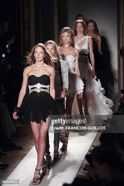 Models present creations by French designer Christophe Decarnin for Balmain during the spring/summer 2009 ready-to-wear collection show in Paris, on...