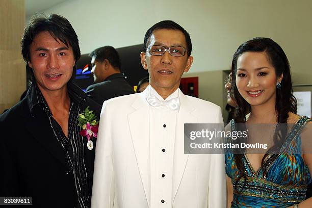 Actor Robin Shou and Festival director Jareuk Kaljareuk and wife Thi Giang Nguyen attend the Golden Kinnaree Awards 2008 at the Aksra Theatre as part...