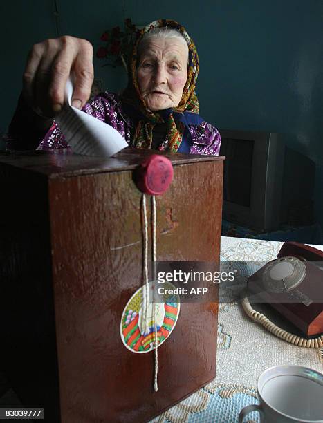 Belarussian woman votes at her house in the village of Voronyany, 180 kms from Minsk, on September 28, 2008. Belarussians voted in parliamentary...