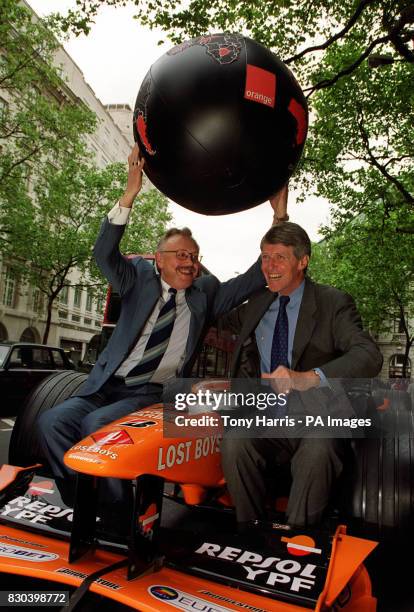 Chairman of mobile phone company France Telecom, Michel Bon and Group Chief Executive of the Orange network Hans Snook following the announcement of...