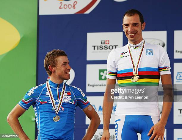 Compatriots Damiano Cunego and Alessandro Ballan of Italy stand on the podium after the Elite Men's Road Race during the 2008 UCI Road World...