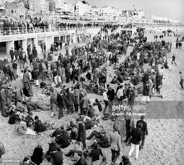 The Mods and Rockers bank holiday riots in Brighton. A large crowd of mods gathered near the Palace Pier on the beach in Brighton, a scene repeated a...