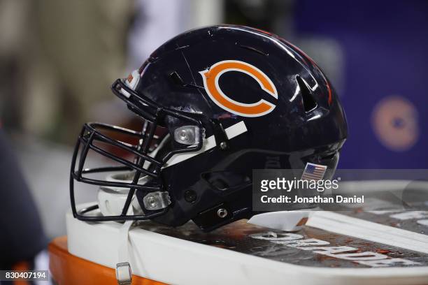 Chicago Bears helmet is seen in the bench area during a preseason game against the Denver Broncos at Soldier Field on August 10, 2017 in Chicago,...