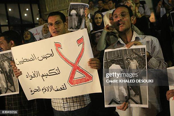 Egyptian journalists protest in front of their union in Cairo on September 28, 2008 in support of Egyptian editor Ibrahim Eissa. An appeals court...