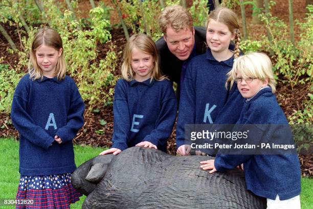 Earl Spencer with his children Amelia, Eliza, Kitty and Louis at the opening of the Diana, Princess of Wales memorial garden, in Hyde Park, which was...