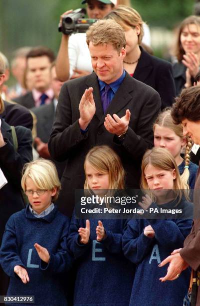 Earl Spencer with his children Louis, Eliza, Kitty and Amelia at the opening of the Diana, Princess of Wales memorial garden, in Hyde Park, which was...