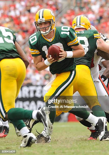 Quarterback Matt Flynn of the Green Bay Packers sets to hand off against the Tampa Bay Buccaneers at Raymond James Stadium on September 28, 2008 in...