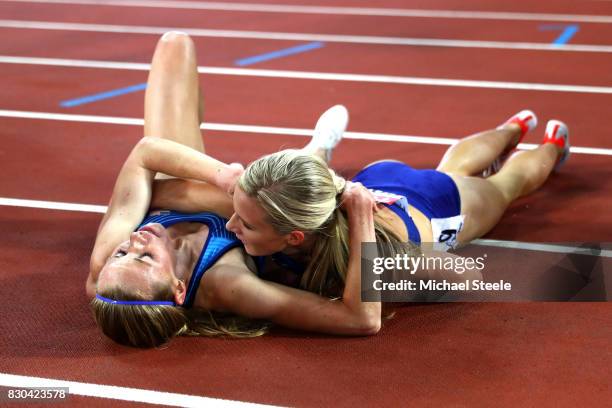 Emma Coburn of the United States, gold, celebrates with Courtney Frerichs of the United States, silver, after the Women's 3000 metres Steeplechase...