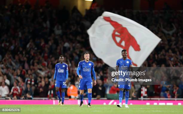 Dejected Jamie Vardy, Daniel Amartey and Wilfred Ndidi of Leicester City after Arsenal score during the Premier League match between Arsenal and...