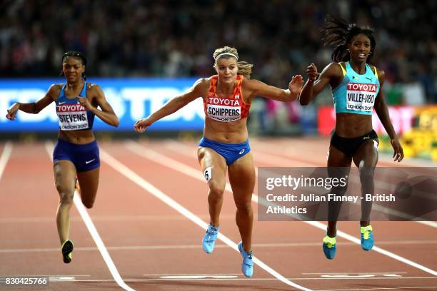 Dafne Schippers of the Netherlands, Shaunae Miller-Uibo of the Bahamas and Deajah Stevens of the United States race to the finish line in the Women's...