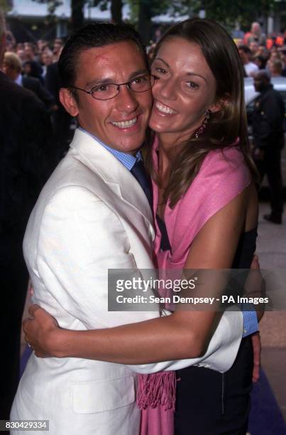Champion jockey Frankie Dettori and his wife Catherine arriving for the European Premiere of the film "Gone In 60 Seconds" at the Odeon West End...
