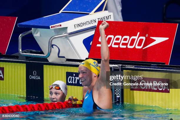 Sarah Sjostrom from Switzerland celebrates after winning the Women's 100m Freestyle Final close to Cate Campbell from Austria during the the...