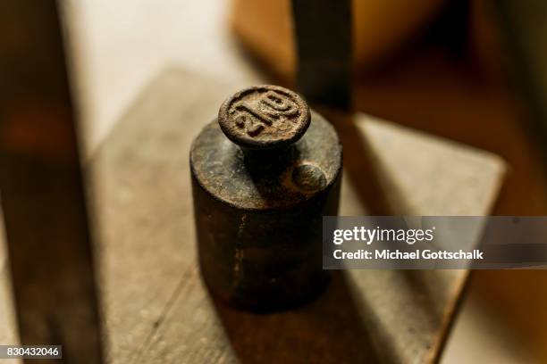 An old Libra with a counterweight of 2 Kilograms at Kanow mill Sagritz on August 09, 2017 in Golssen, Germany.