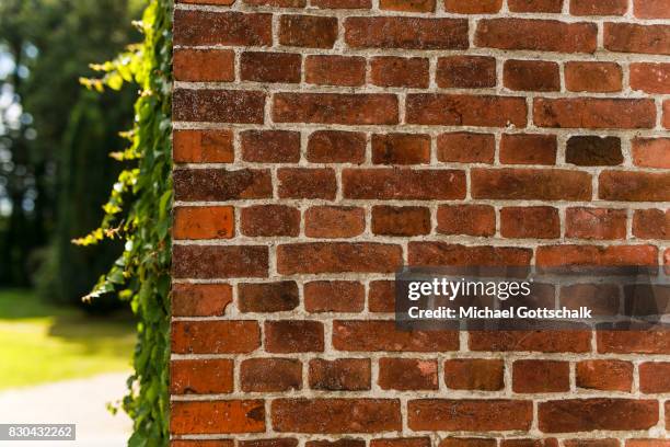 Wall made by red brick stones at Kanow mill Sagritz on August 09, 2017 in Golssen, Germany.