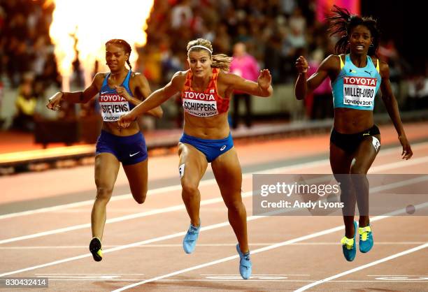 Dafne Schippers of the Netherlands, Shaunae Miller-Uibo of the Bahamas and Deajah Stevens of the United States cross the finish line in the Women's...