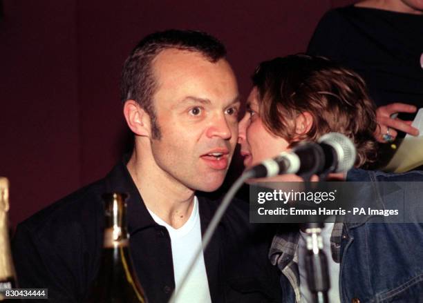 Television presenter Graham Norton and comedienne Donna McPhail, two of the judges, at the Miss Lesbian Beauty 2000 pageant, at the Talk of London,...