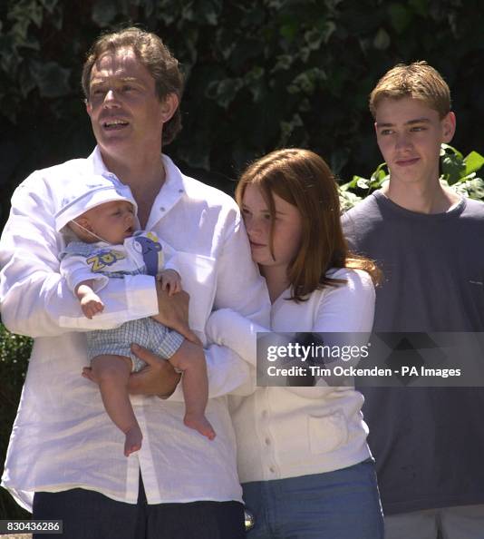 Prime Minister Tony Blair with baby Leo, daughter Kathryn and son
