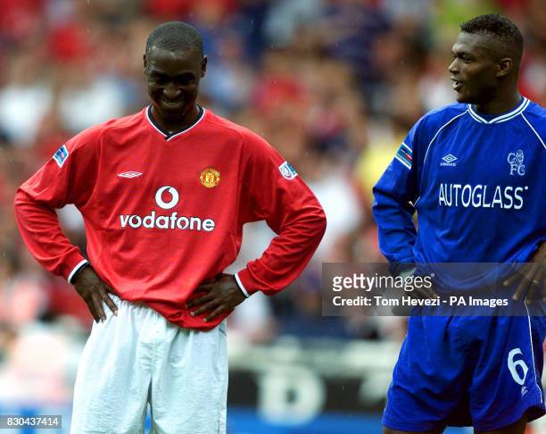 This picture can only be used within the context of an editorial feature.Chelsea's Marcel Desailly and Manchester United's Andy Cole share a joke...