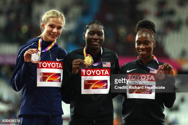 Darya Klishina of the Authorised Neutral Athletes, silver, Brittney Reese of the United States, gold, and Tianna Bartoletta of the United States,...