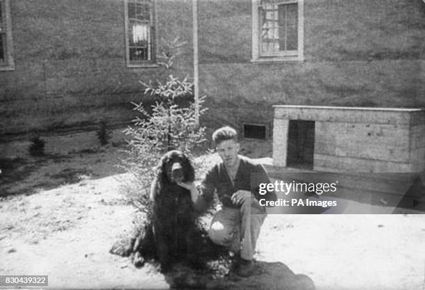 Undated collect picture of Gander the dog and unidentified male. The animal was awarded a Dickin Medal by the People's Dispensary for Sick Animals...