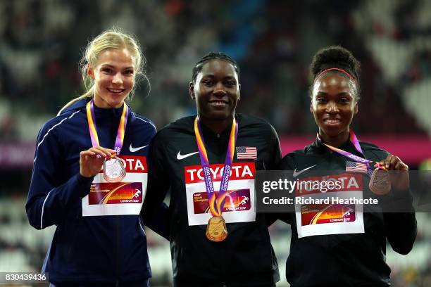 Darya Klishina of the Authorised Neutral Athletes, silver, Brittney Reese of the United States, gold, and Tianna Bartoletta of the United States,...