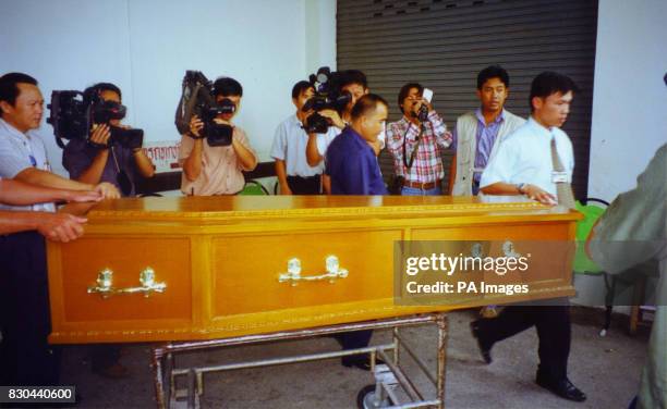 The coffin containing the body of British backpacker Kirsty Jones leaves the morgue at Maharaj University Hospital in Chiang Mai on the way back to...