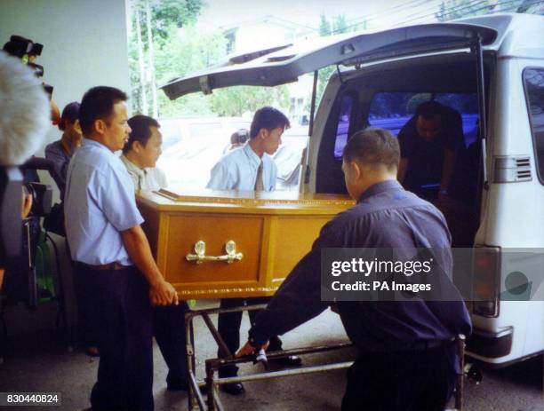The coffin containing the body of British backpacker Kirsty Jones is placed in a vehicle outside the morgue at Maharaj University Hospital in Chiang...