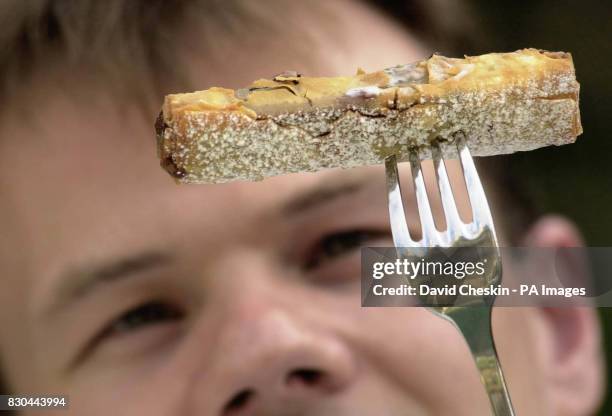 Chef Richard Glennie inspects one of Scotland's most infamous delicacies, a deep fried Mars Bar which has made its way onto the dessert menu at...