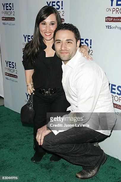 Actress Meredith Eaton and guest attend the "Yes on Prop 2" benefit at a private residence on September 28, 2008 in Los Angeles, California.
