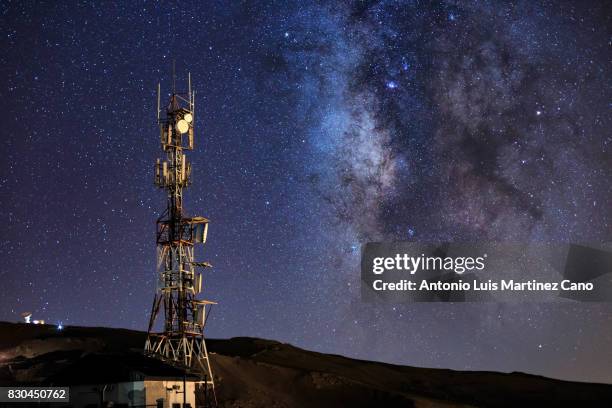 communications tower and the milky way - radio antenna stock pictures, royalty-free photos & images