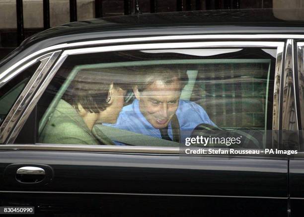 Brittain's Prime Minister Tony Blair and wife Cherie leave their official London residence Downing Street with their son Leo in a carry cot. The...