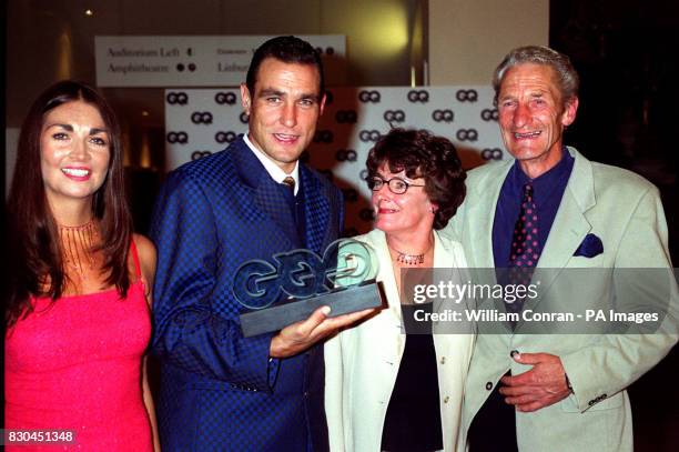 Ex-footballer & actor Vinnie Jones with his wife Tanya and parents at the GQ Man of the YearAwards party in London.