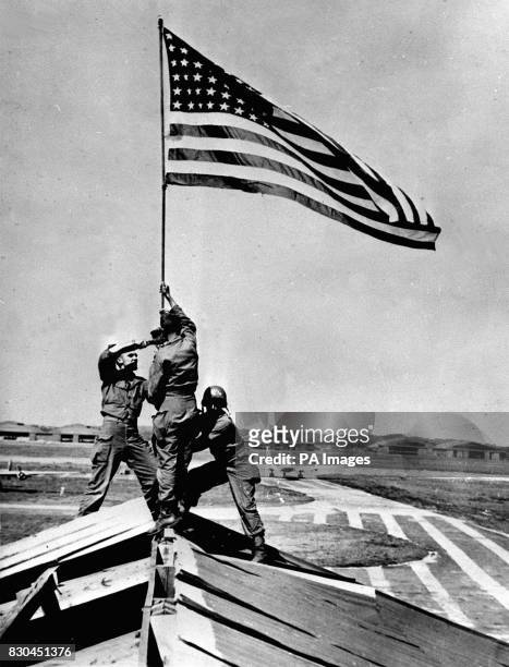 Recalling the Iwo Jima flag-raising, four members of the United States 11th Airborne Division, among the first troops to be landed in Japan from...