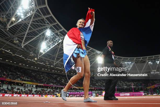 Dafne Schippers of the Netherlands, celebrates after winning gold in the Women's 200 metres final during day eight of the 16th IAAF World Athletics...